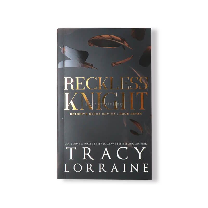 Paperback Dark Romance Novel with Foiling on the Cover and Foiled Edges