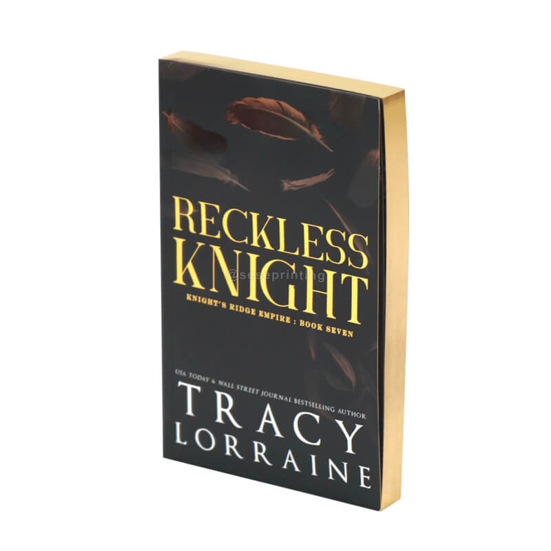 Paperback Dark Romance Novel with Foiling on the Cover and Foiled Edges