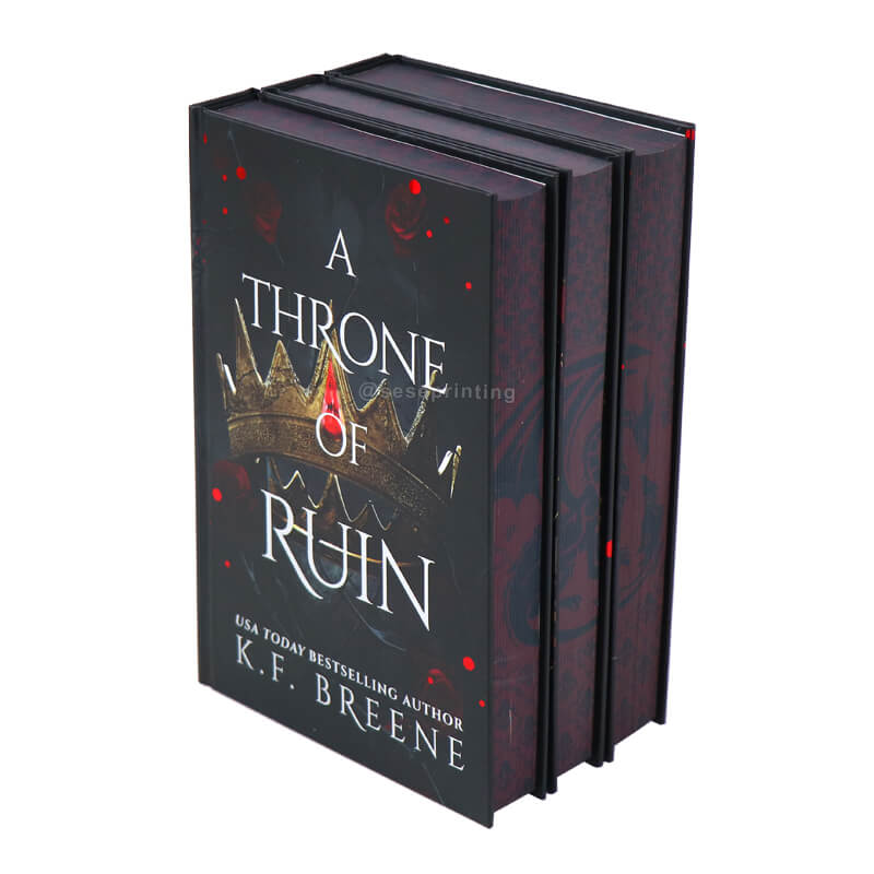 Three-Volume Set of Books with Foiled Cover and Image Sprayed Edges