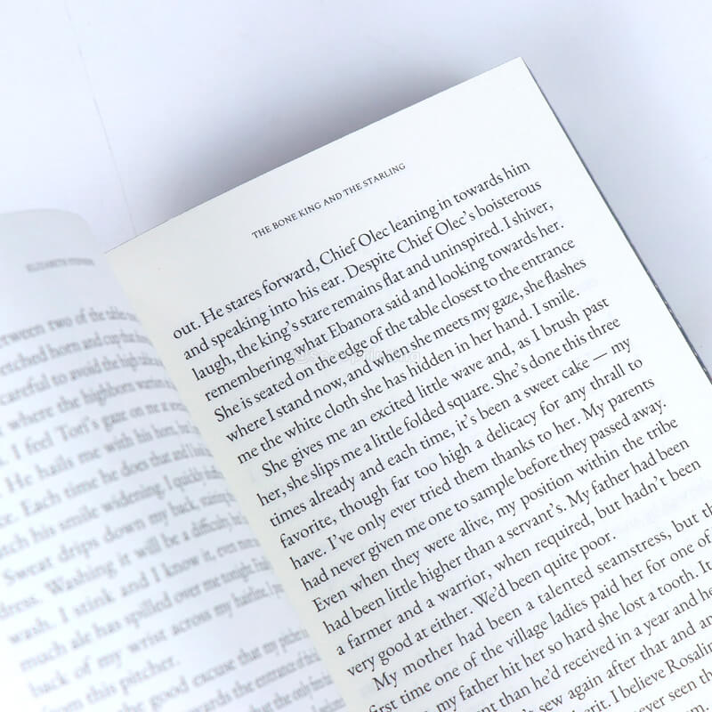 Paperback Books with Custom Sprayed Edges and Foil on the Title