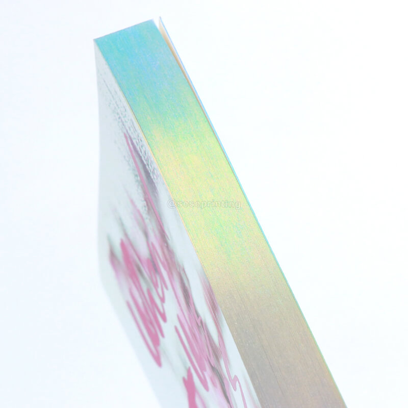 Paperback Books Printed with Foiling on the Cover and Holographic Silver Edges