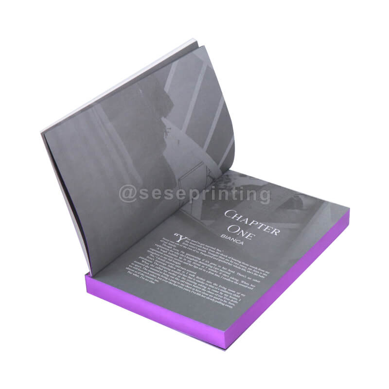 Softcover Print Run of a Novel with Foil Stamping and Embossing Cover, Custom Sprayed Edges