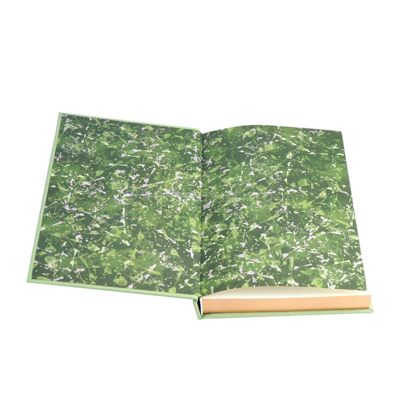 Cloth Bound Hardcover with Foil Stamped Cover, Custom Endpaper, And Sprayed Edges