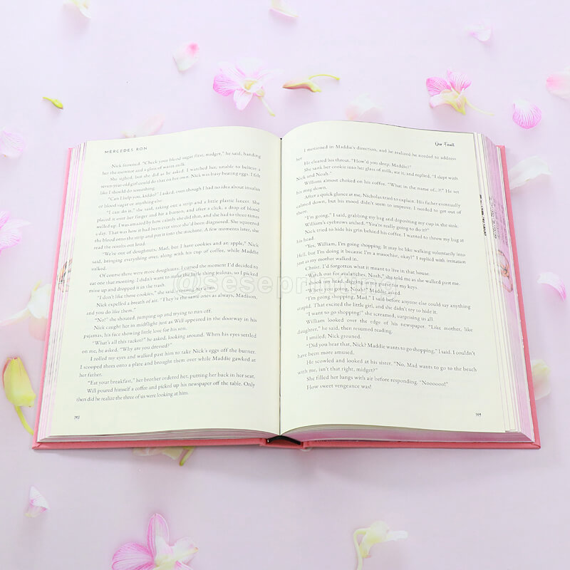 Cloth Bound Hardcover Fantasy Novel with Sprayed Edges, Foiled End Papers, and Foiling